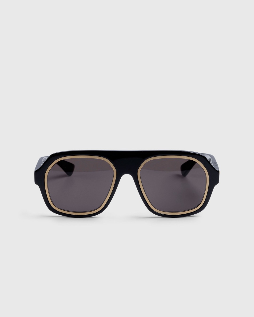Black aviator sunglasses with gold trim 2025
