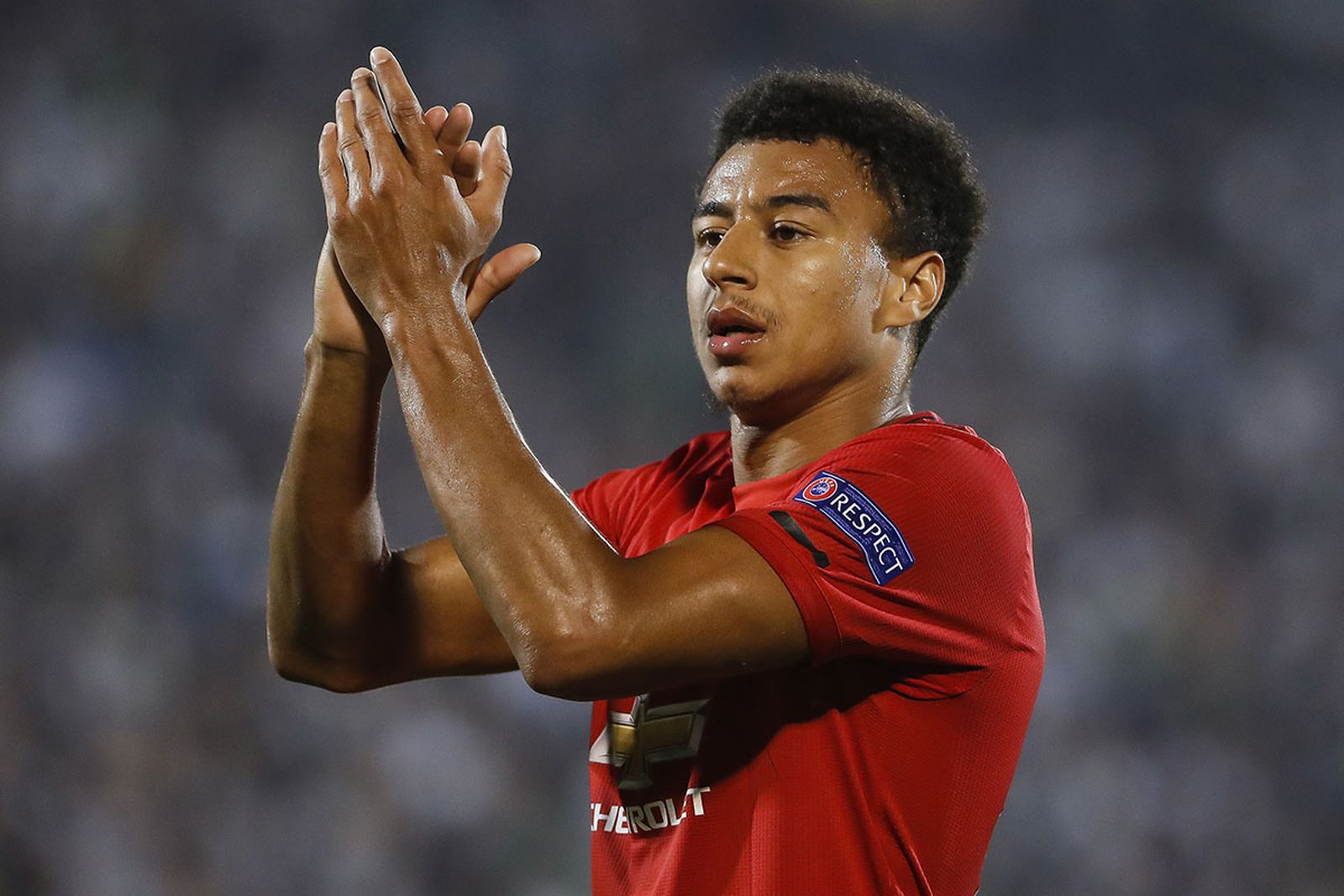 Jesse Lingard of Manchester United waves to the fans
