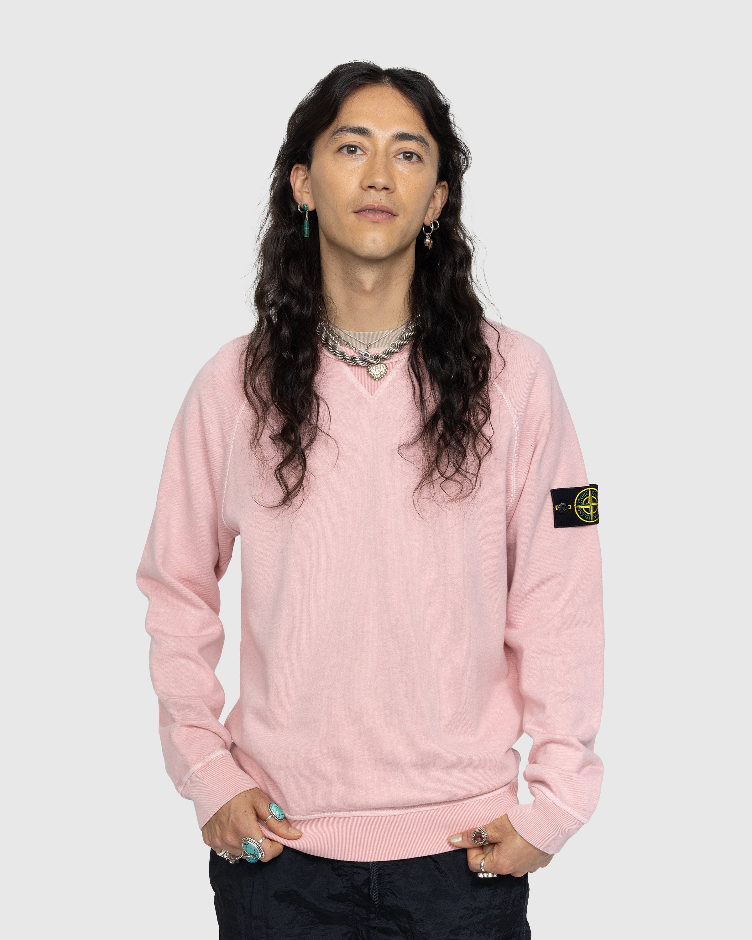 Pink stone island on sale shirt