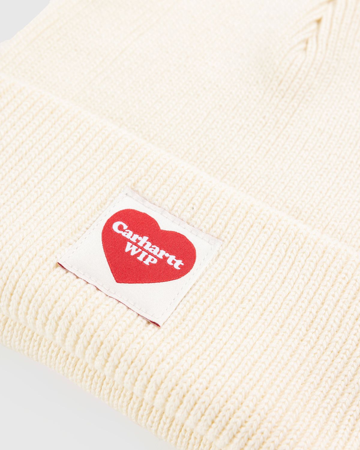 red and white carhartt beanie