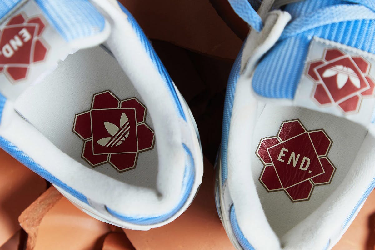The END. x adidas Originals ZX 9000 collaborative sneaker in blue, grey, and terracotta colors.