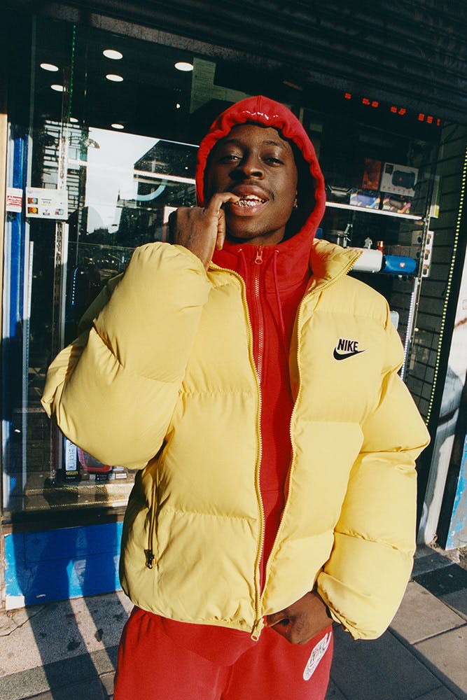 Nike yellow puffer jacket sale