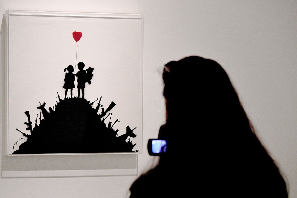 kaws-banksy-auction-phillips-01
