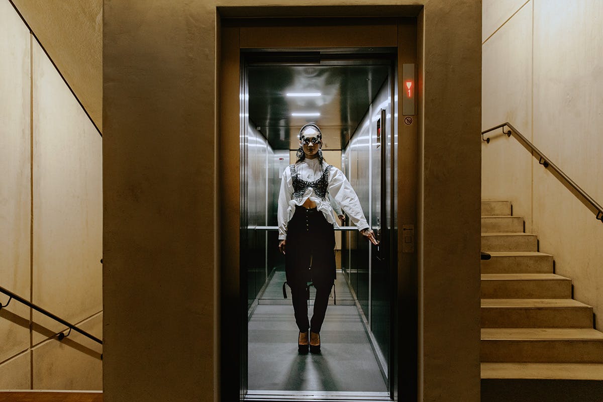 Cap: Hungry, Shirt: Catalogue Of Disguise, Skirt & Heels: Alexandru Plesco