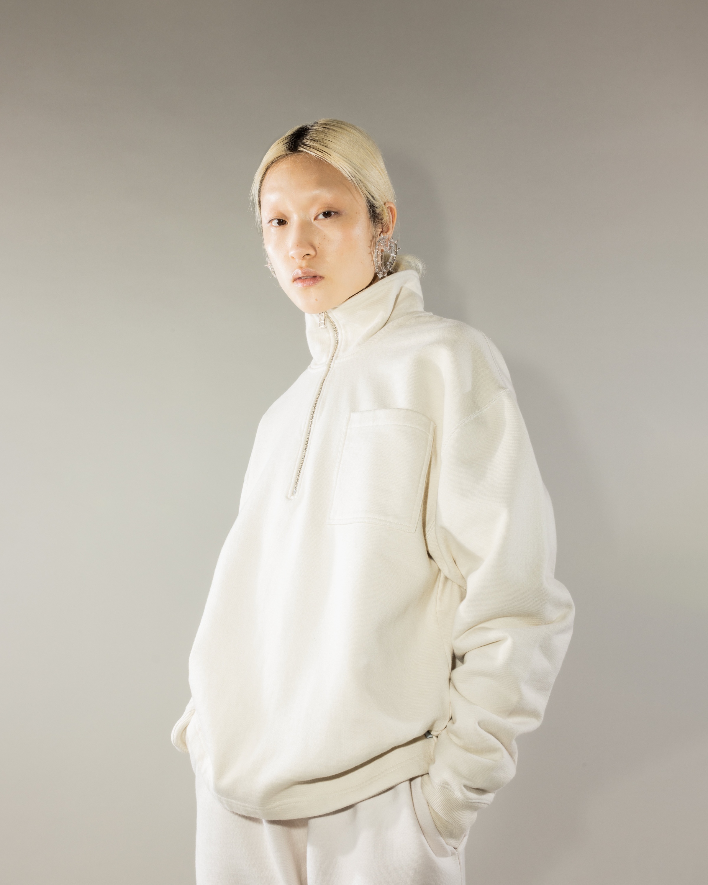 Off white quarter zip top