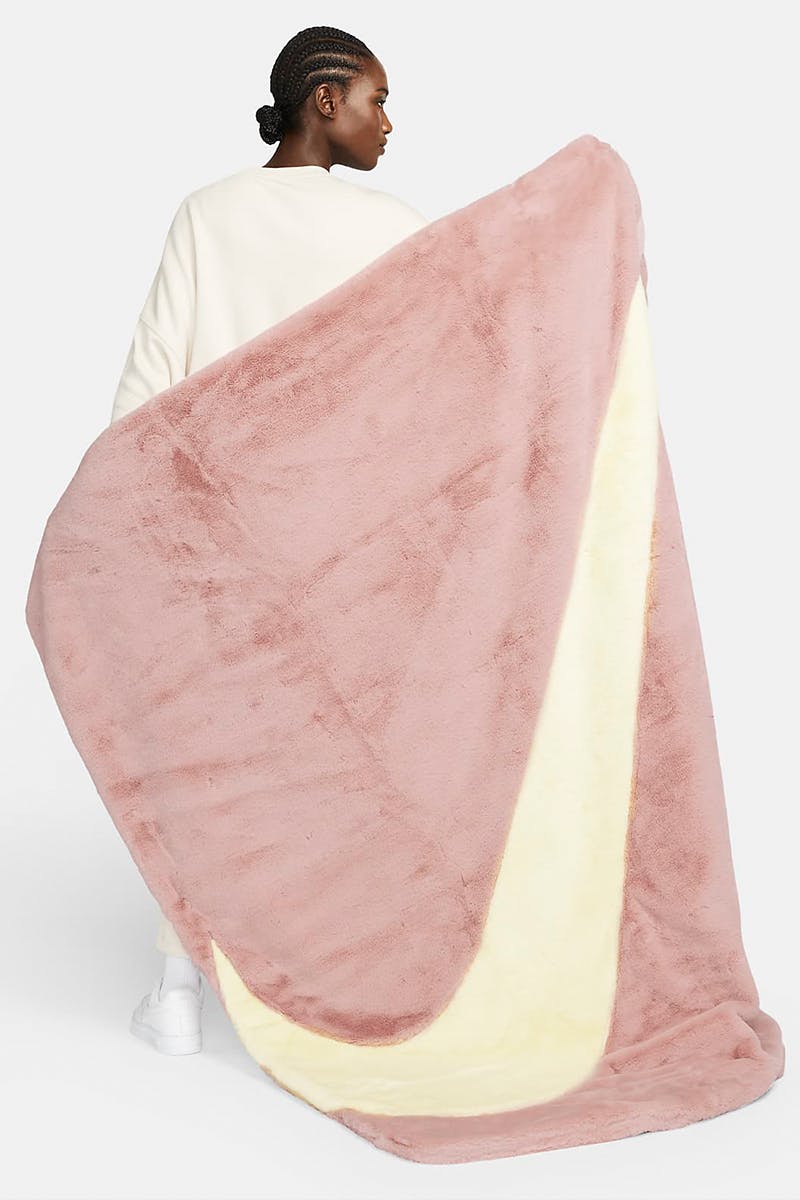 Nike's Faux Fur Swoosh Blankets are Cozy Season Certified