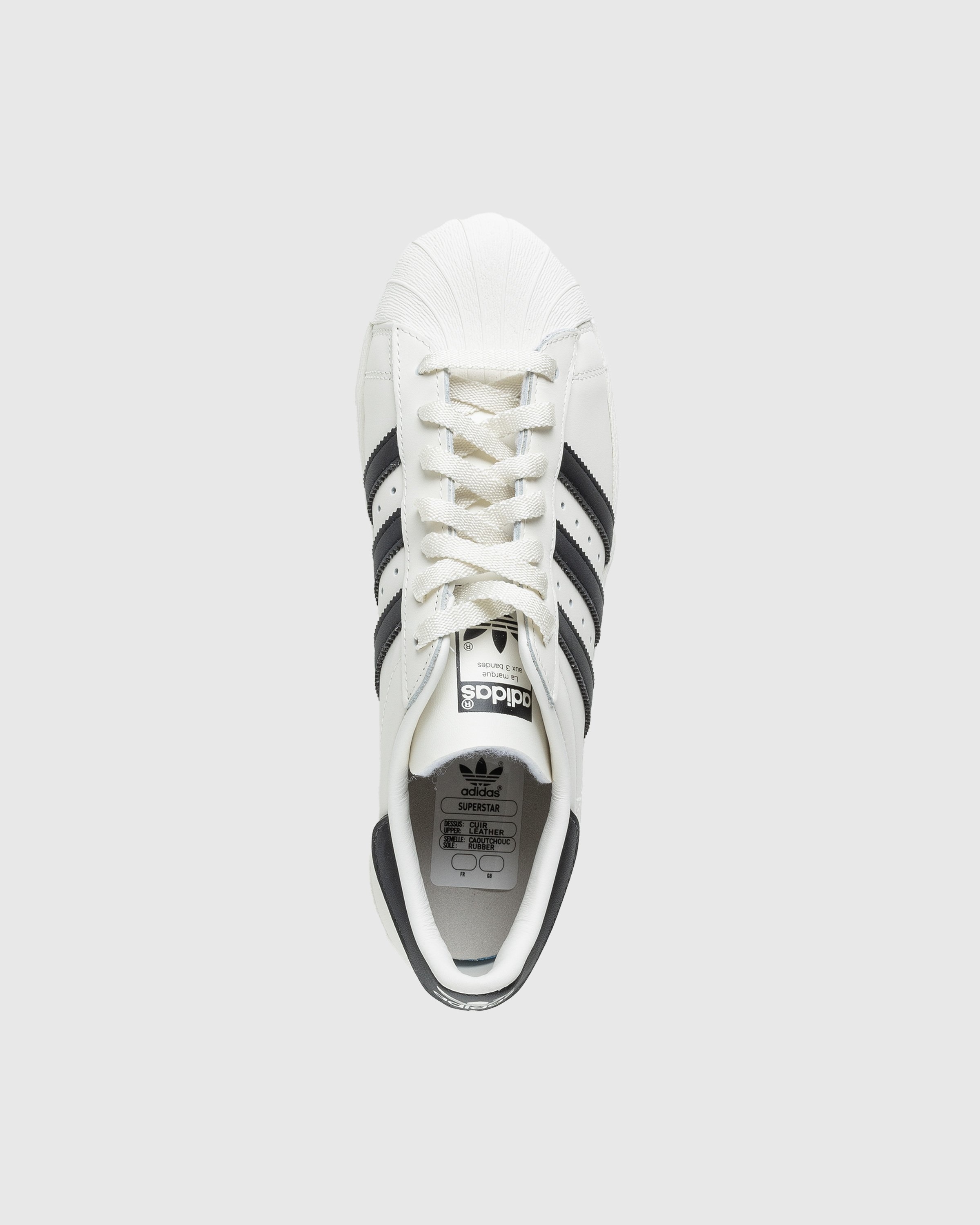 Adidas superstar outlet black white sole