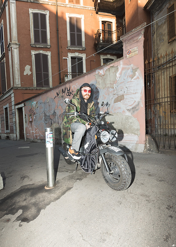 Alberto Panocchi wears Matteo Lamandini Studio pants, a Fuct sweatshirt and a vintage military parka.