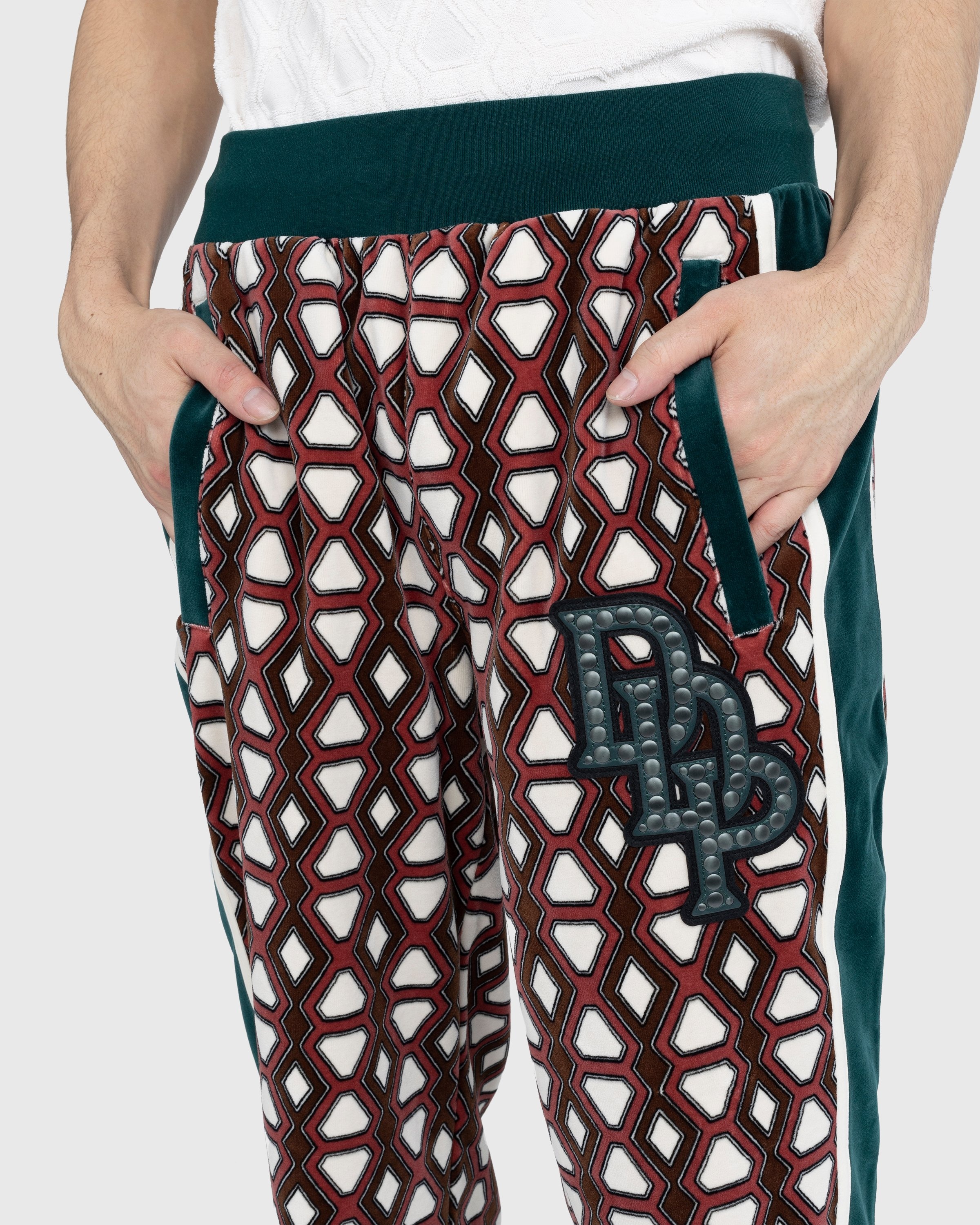 Shop Louis Vuitton MONOGRAM Graphic monogram nylon jogging pants