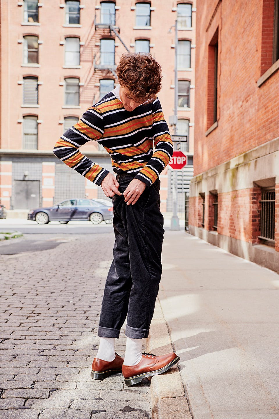 Top: Long-Sleeve Tee in Black Multistripe Bottom: Taper Trouser in Caviar