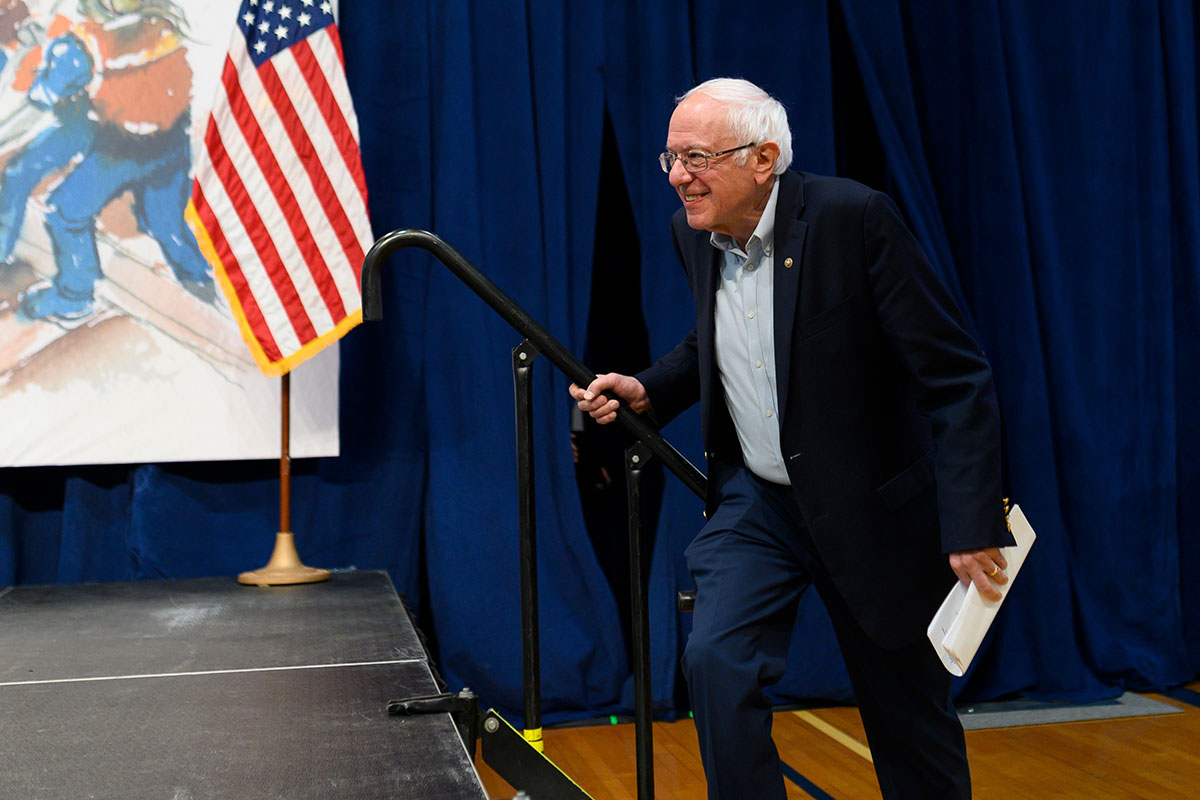 Bernie Sanders walking onto the stage