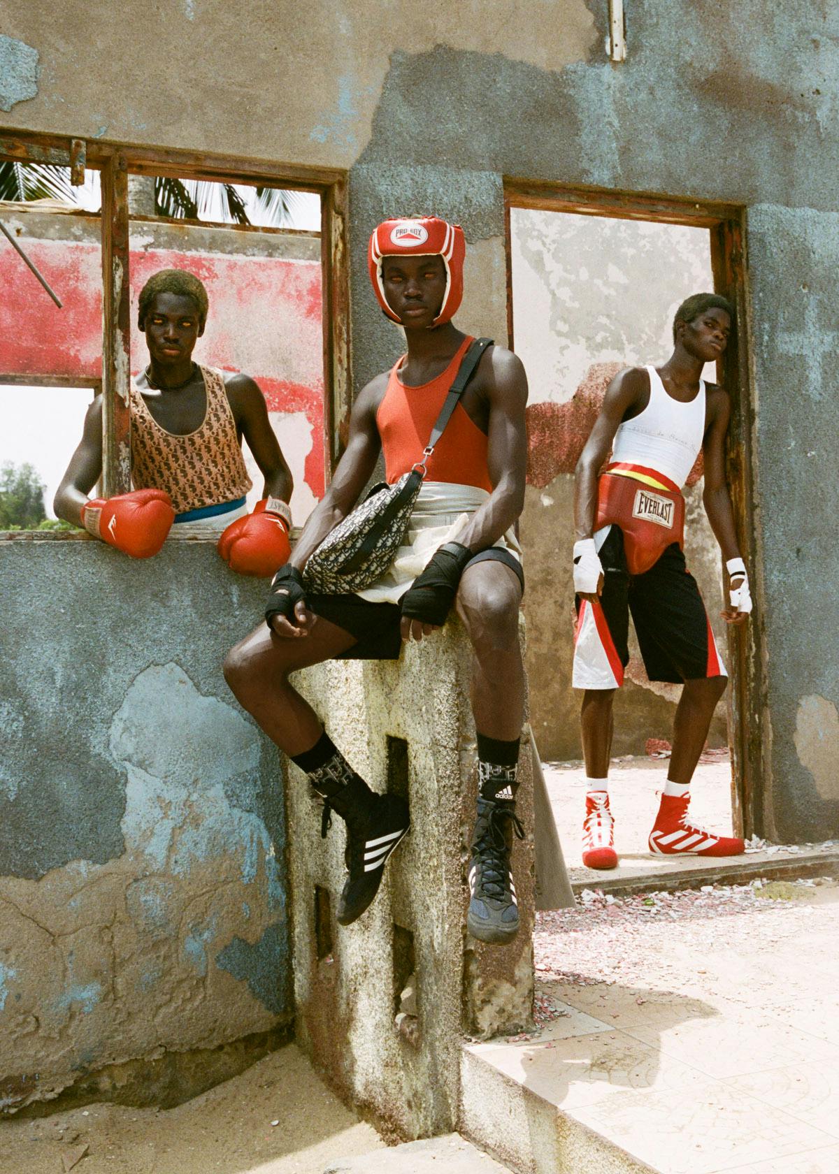 KWABENA Tank top and belt DIOR MEN BEDZO Tank top RICK OWENS Shorts BODE Shorts worn underneath, belt, socks, and bag DIOR MEN Shoes ADIDAS QUAYE Tank top LUDOVIC DE SAINT SERNIN Shorts STYLIST’S OWN Belt DIOR MEN Shoes and socks ADIDAS