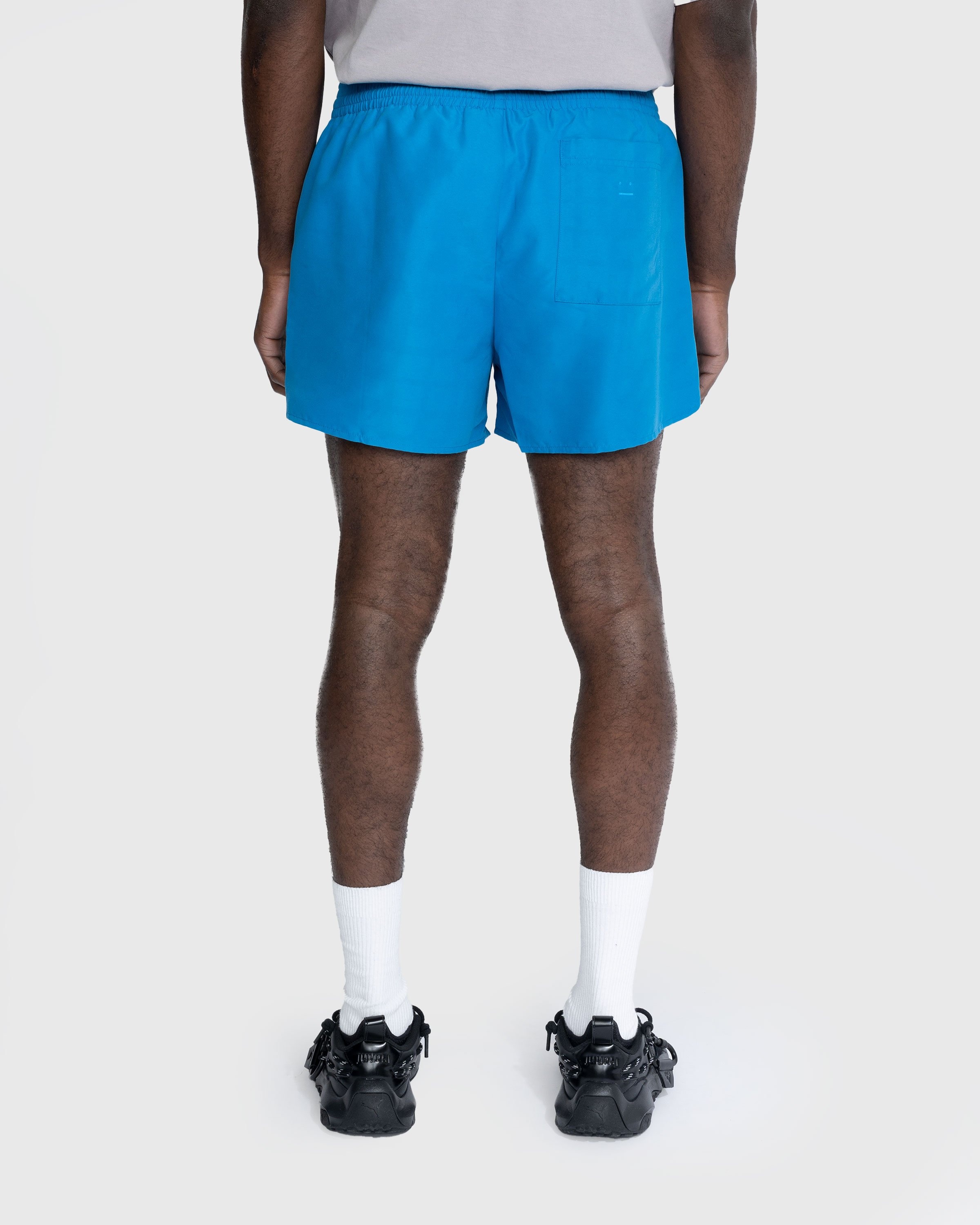 Acne Studios – Water Reactive Logo Swim Shorts Blue - Swimwear - Blue - Image 3