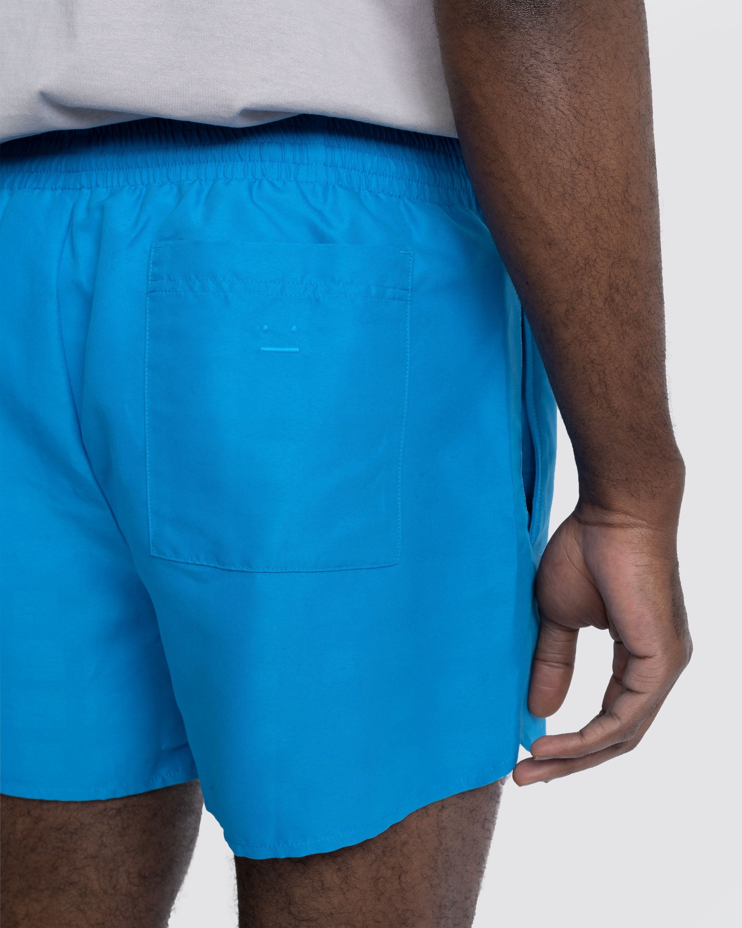 Acne Studios – Water Reactive Logo Swim Shorts Blue - Swimwear - Blue - Image 6