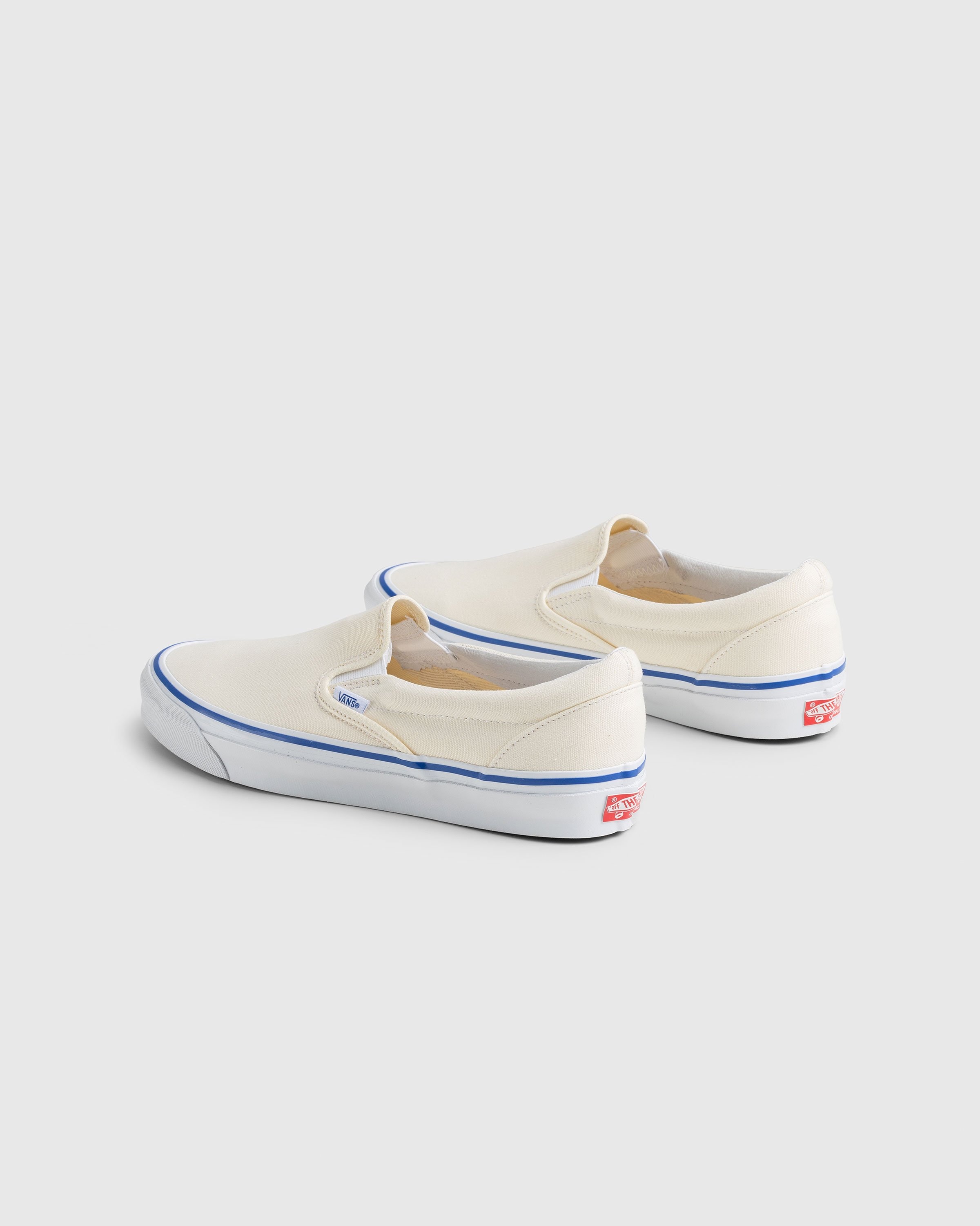 Vans classic slip discount on white womens