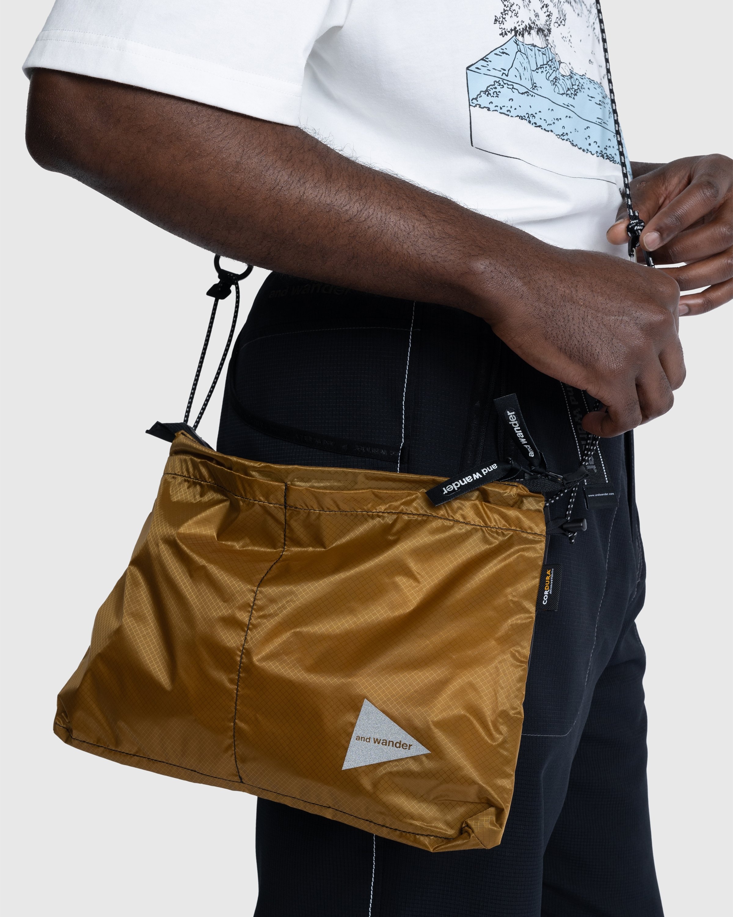 And Wander Sil Sacoche Gold Highsnobiety Shop