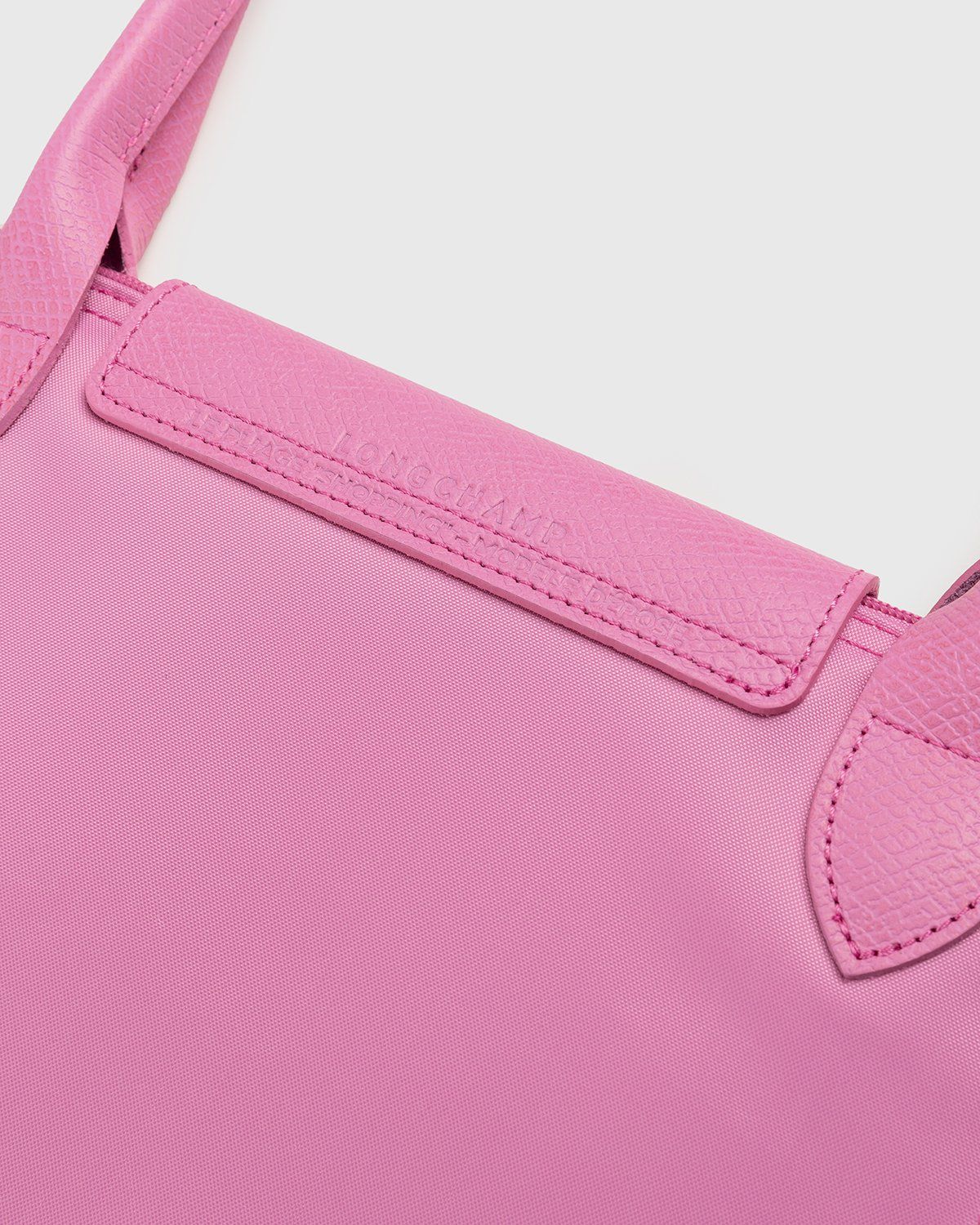 Longchamp x André Saraiva – Le Pliage André Pouch Pink