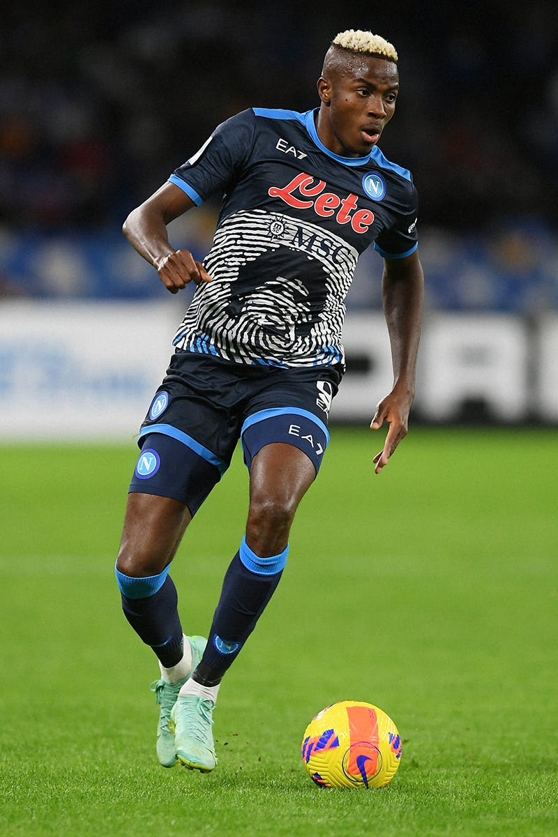 Victor Osimhen receives possession in Napoli's commemorative Maradona shirt