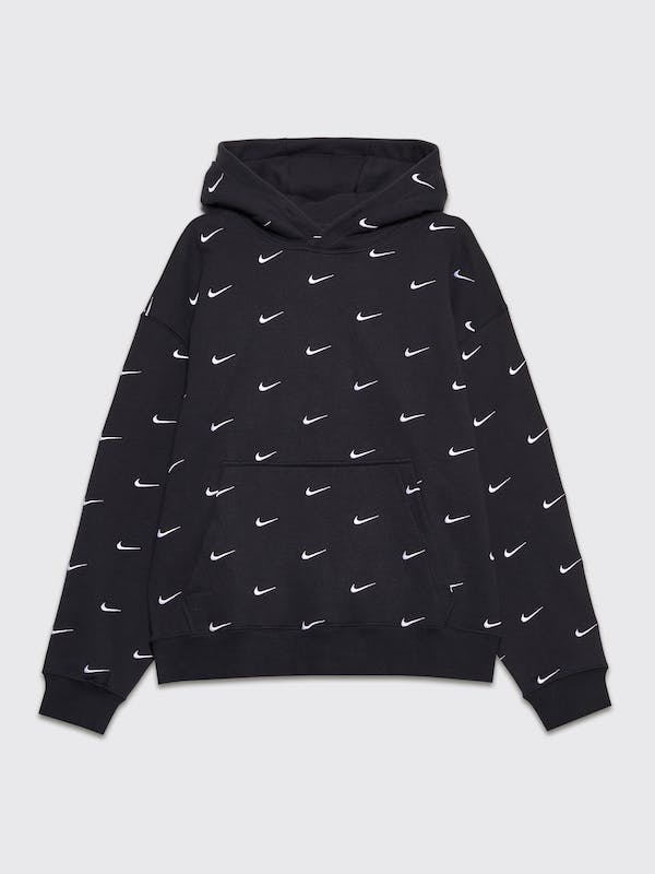 white nike jumper with black ticks all over