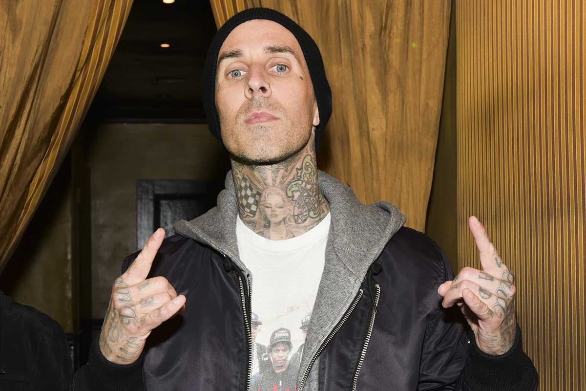 travis-barker-erd-iron-cross-sweater-outfit-style-1