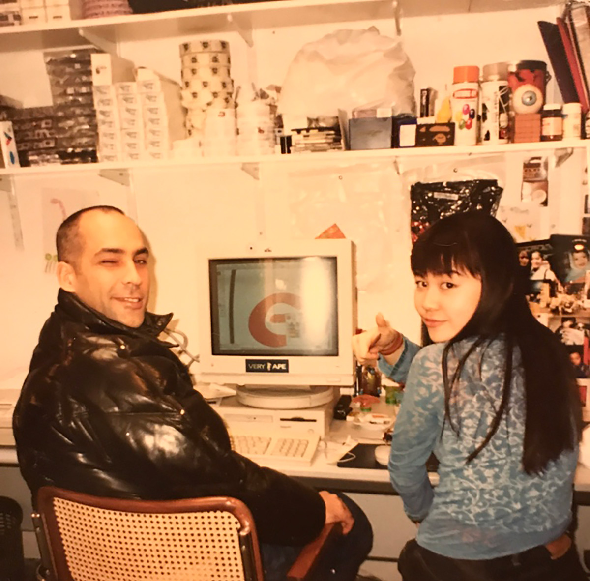 Hitomi Yokoyama with James Lebon sitting in front of a computer