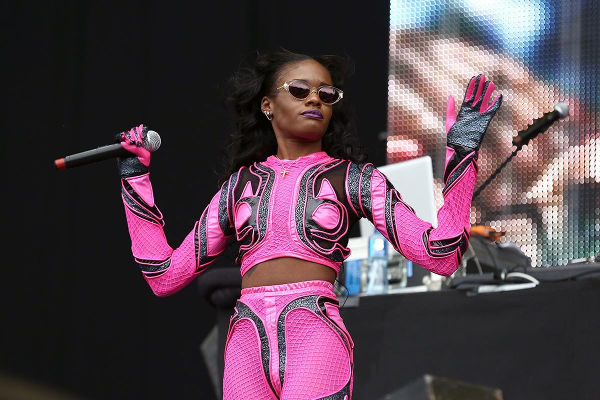 Azealia Banks performs shades pink outfit