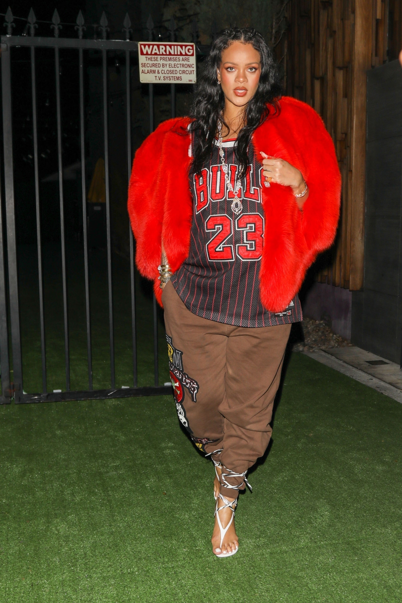 *EXCLUSIVE* Pregnant Rihanna wears a Chicago Bulls jersey while out to dinner