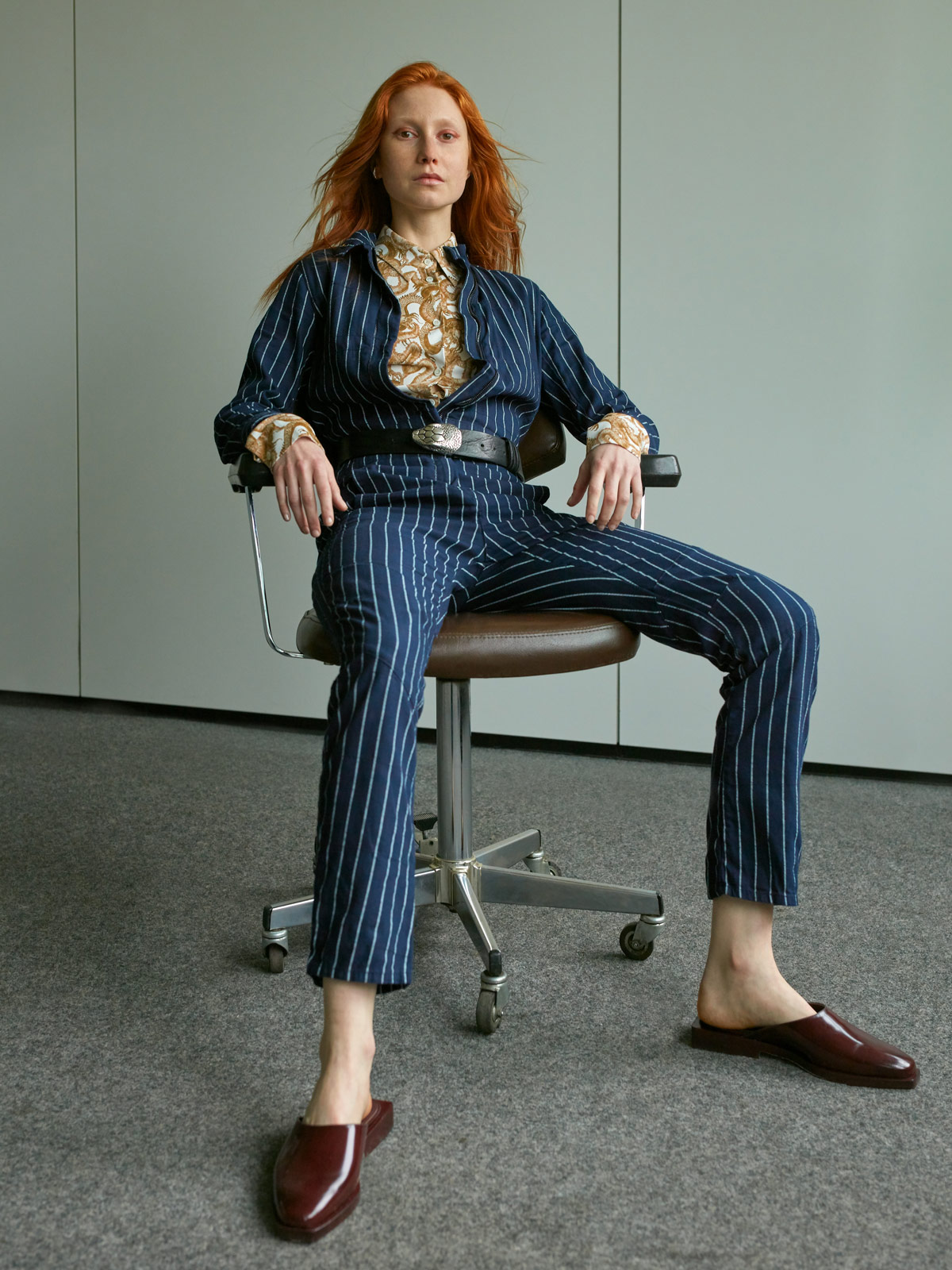 Jessica wears G-Star suit, Wunderkind blouse, Jil Sander slippers, and stylist's own belt.