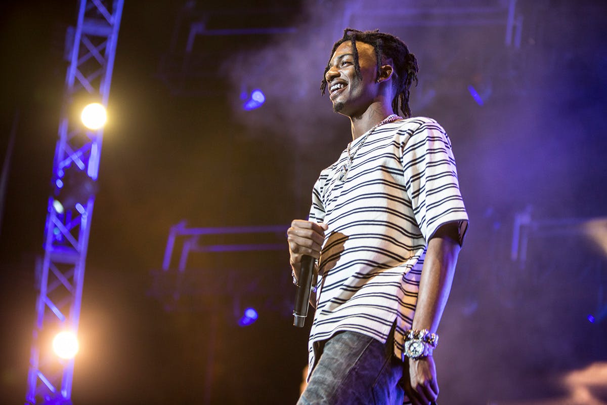 playboi carti performing striped t-shirt