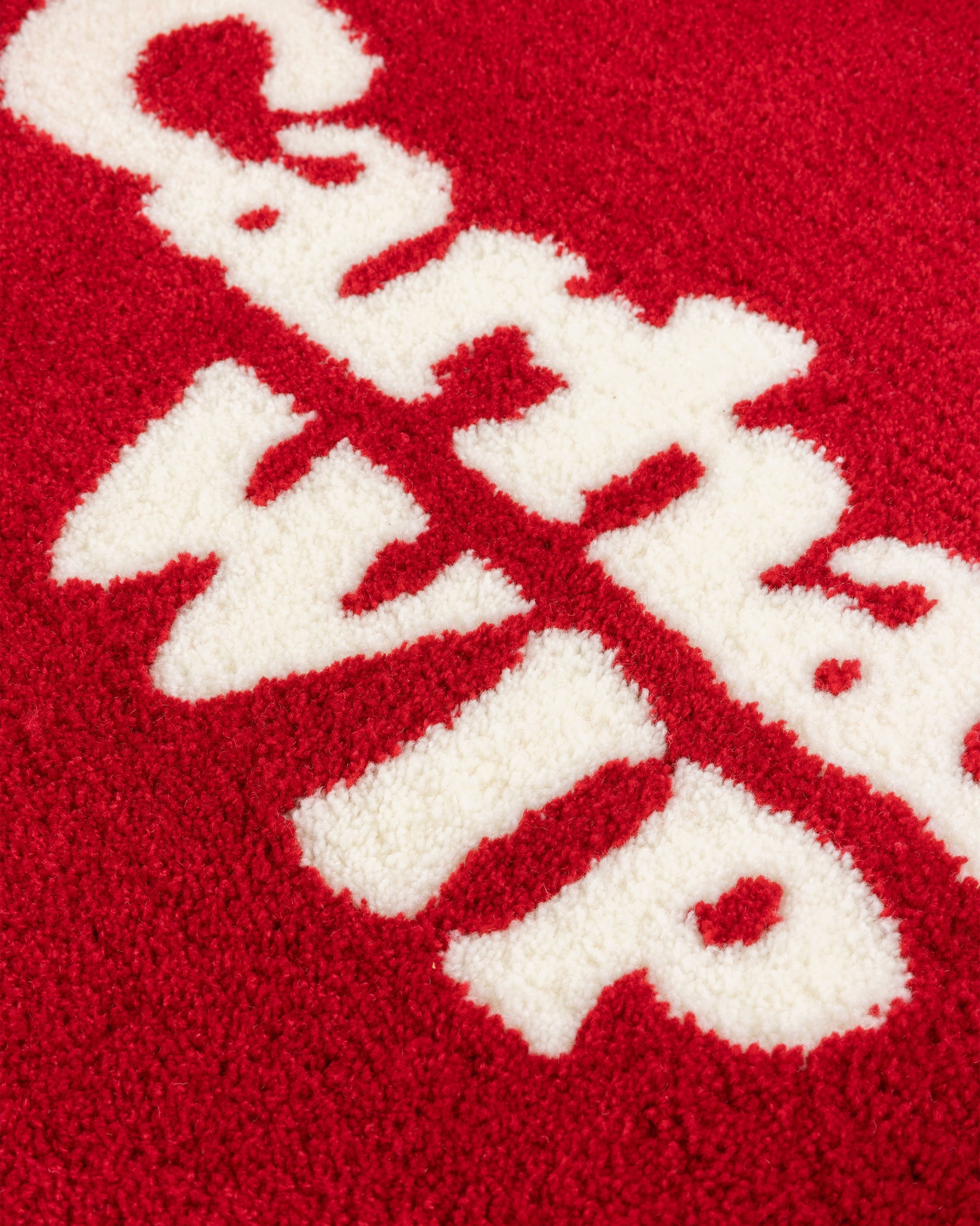 red supreme rug