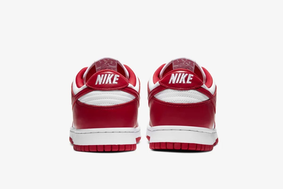 Red and white Nike Dunk Low side view