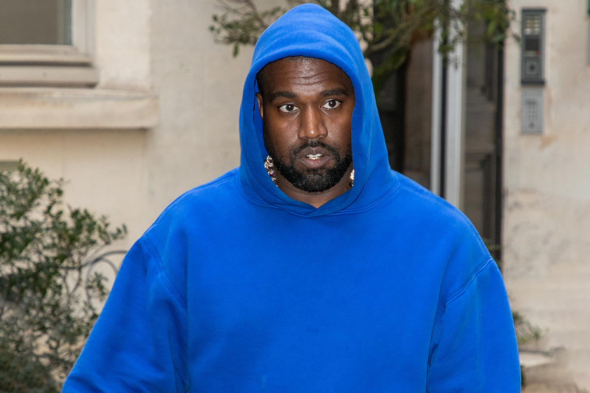 Kanye West dons a blue hoodie in Paris