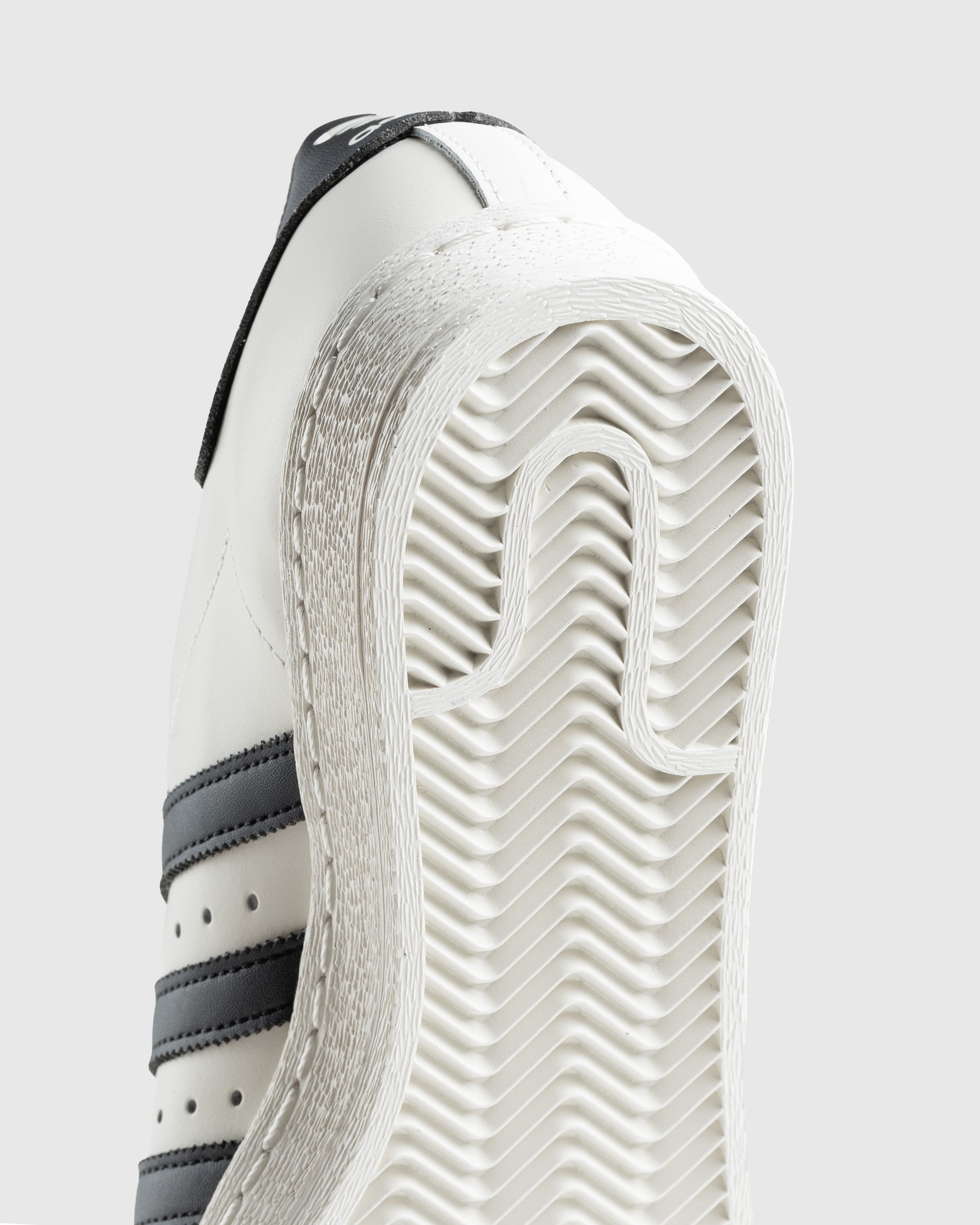 Adidas superstar black white sole discount