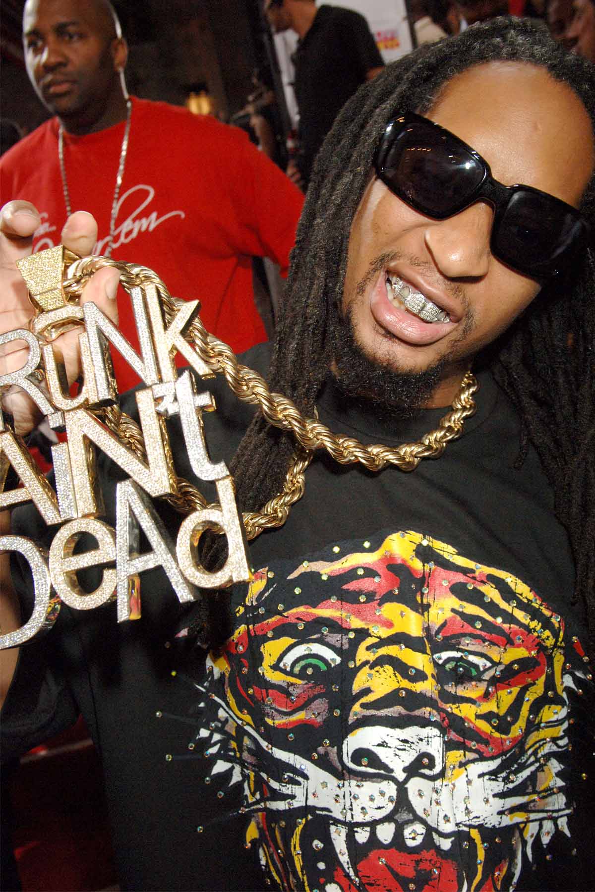 Lil Jon during the 2006 MTV Video Music Awards flaunting his iconic 'Crunk Ain't Dead' chain.