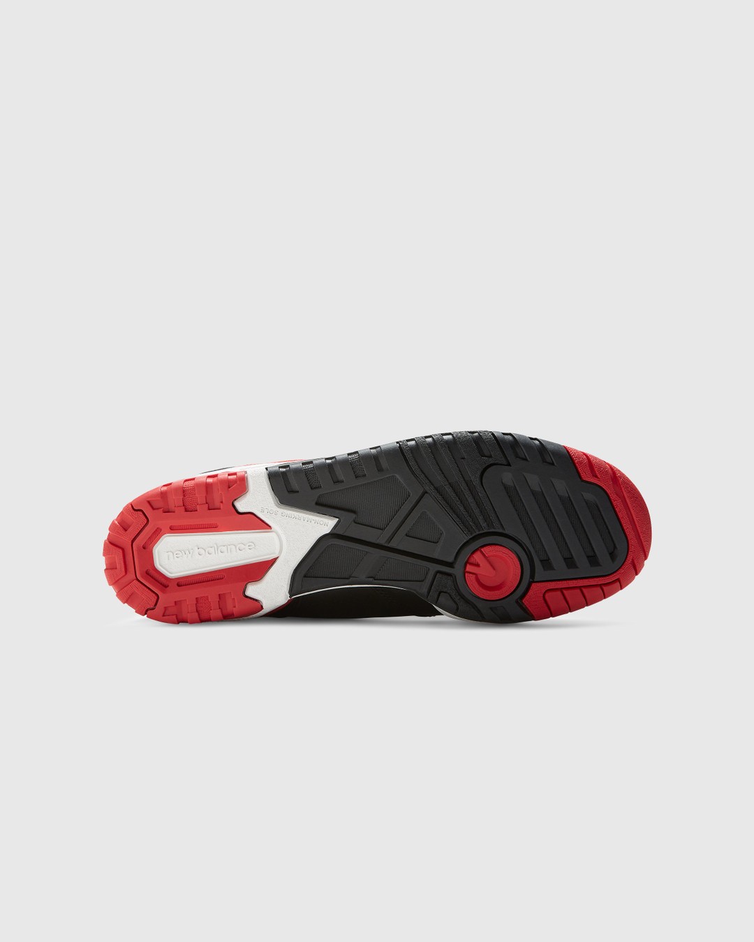 New balance black hotsell with red sole
