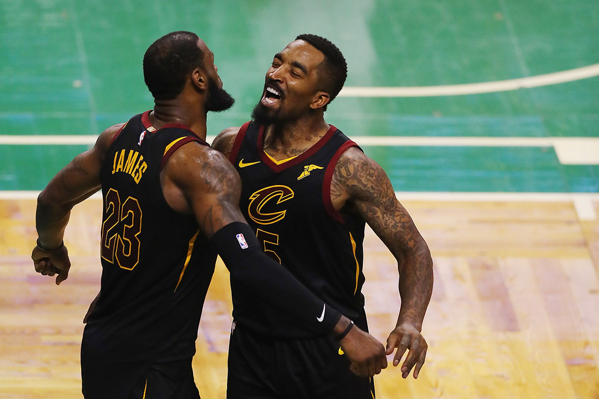 LeBron James #23 of the Cleveland Cavaliers celebrates with JR Smith #5 in the second half against the Boston Celtics during Game Seven of the 2018 NBA Eastern Conference Finals at TD Garden on May 27, 2018 in Boston
