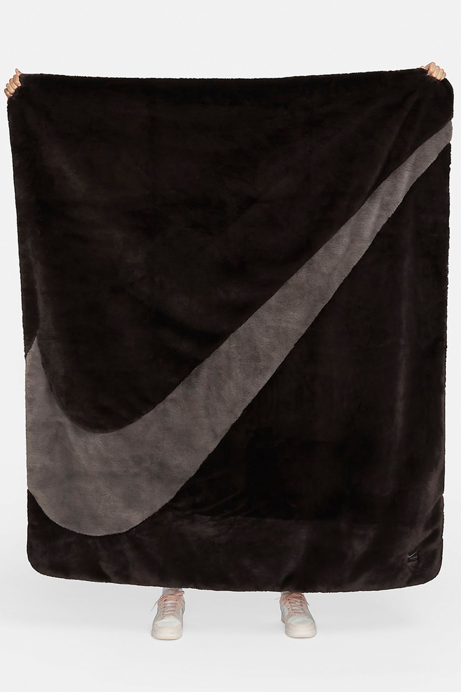 Nike's Faux Fur Swoosh Blankets are Cozy Season Certified