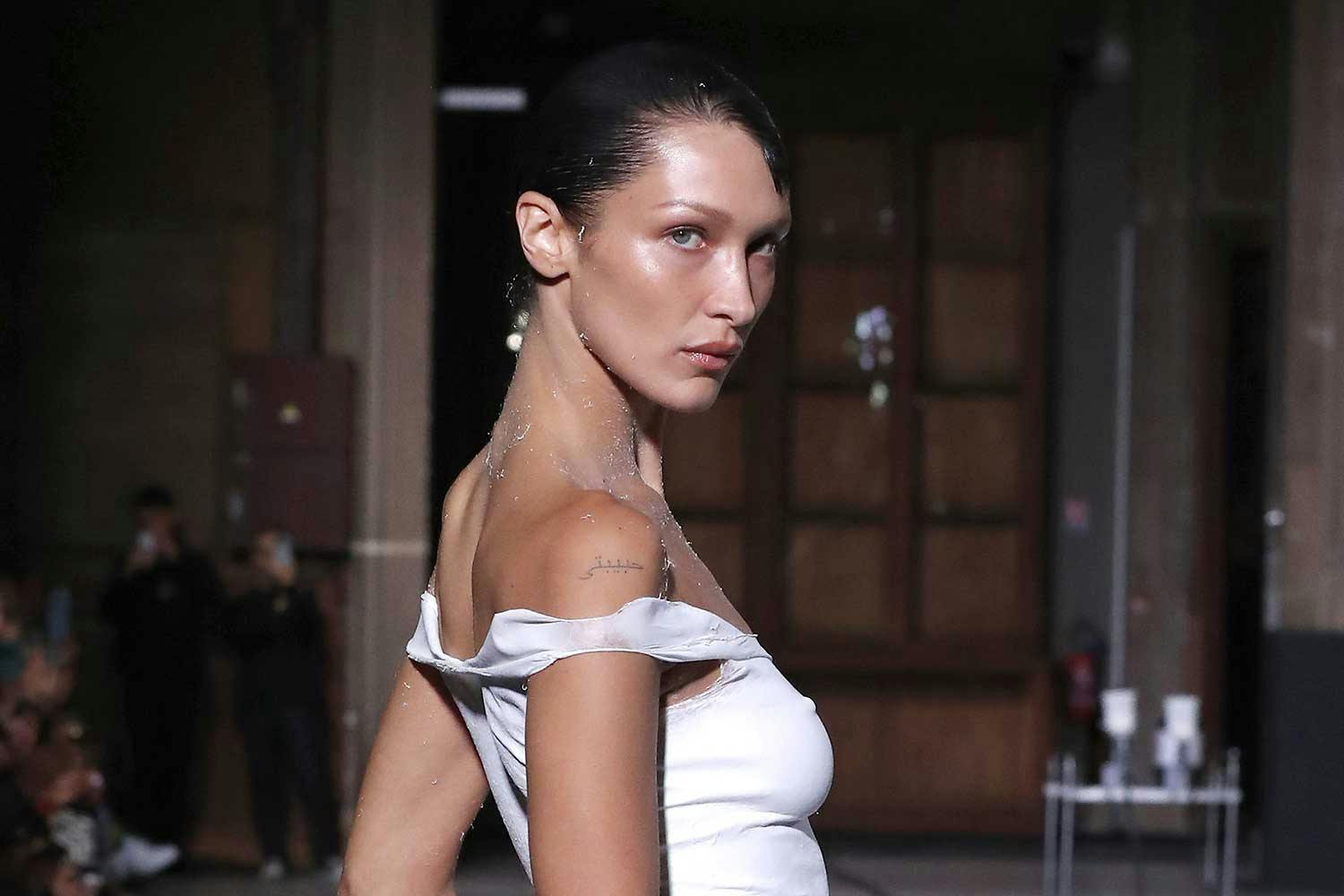bella hadid spray on dress Bella hadid's nude spray-painted dress made
impact by going viral