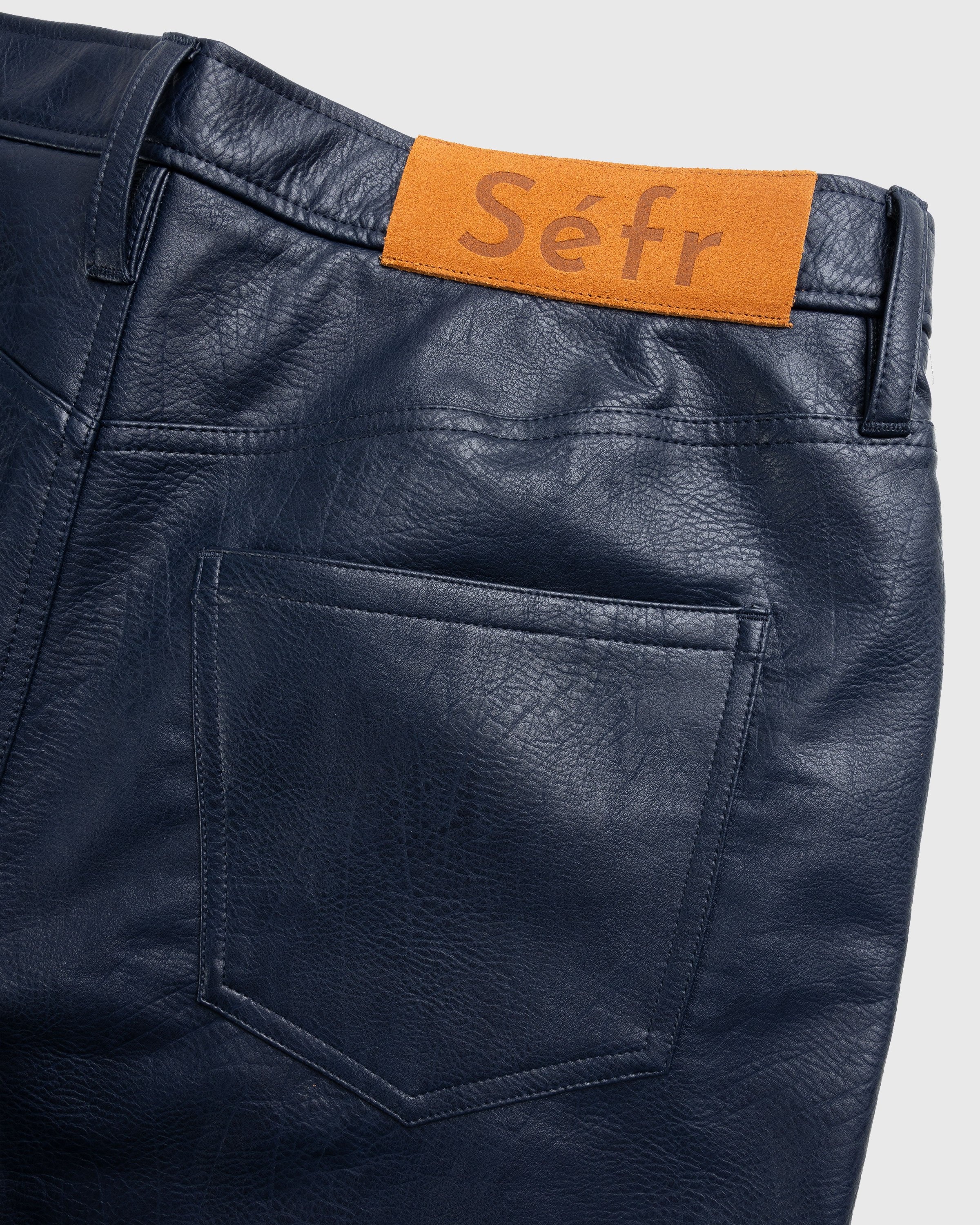 Navy blue leather store pants