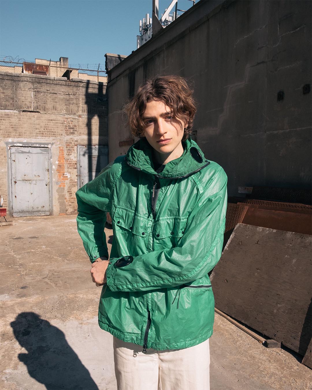 Self-taught clothing and footwear designer Avery Ginsberg wears the NyBer Special Dyed Goggle Jacket from C.P. Company's SS20 collection.
