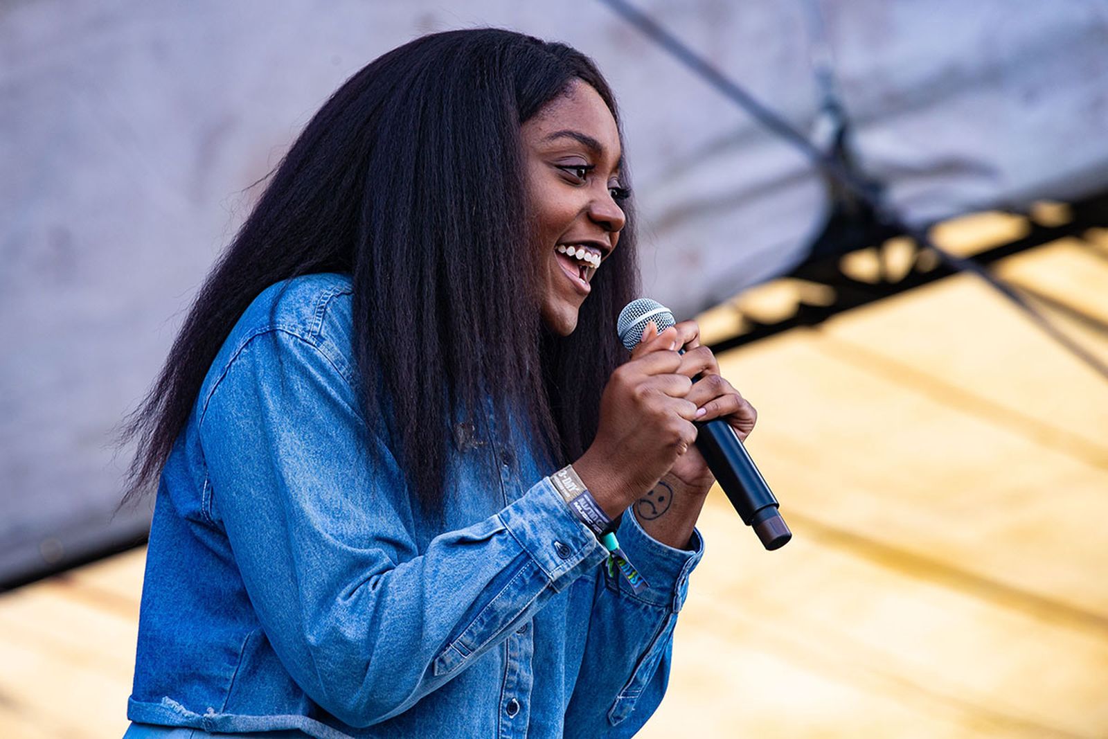 noname performing jeans jacket