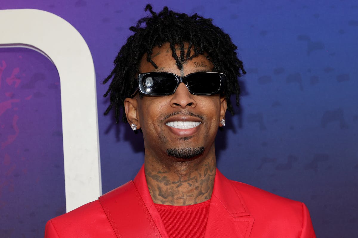 21 Savage Dons Denim Tears 'Fit for Tour with Drake - Vimarsana News
