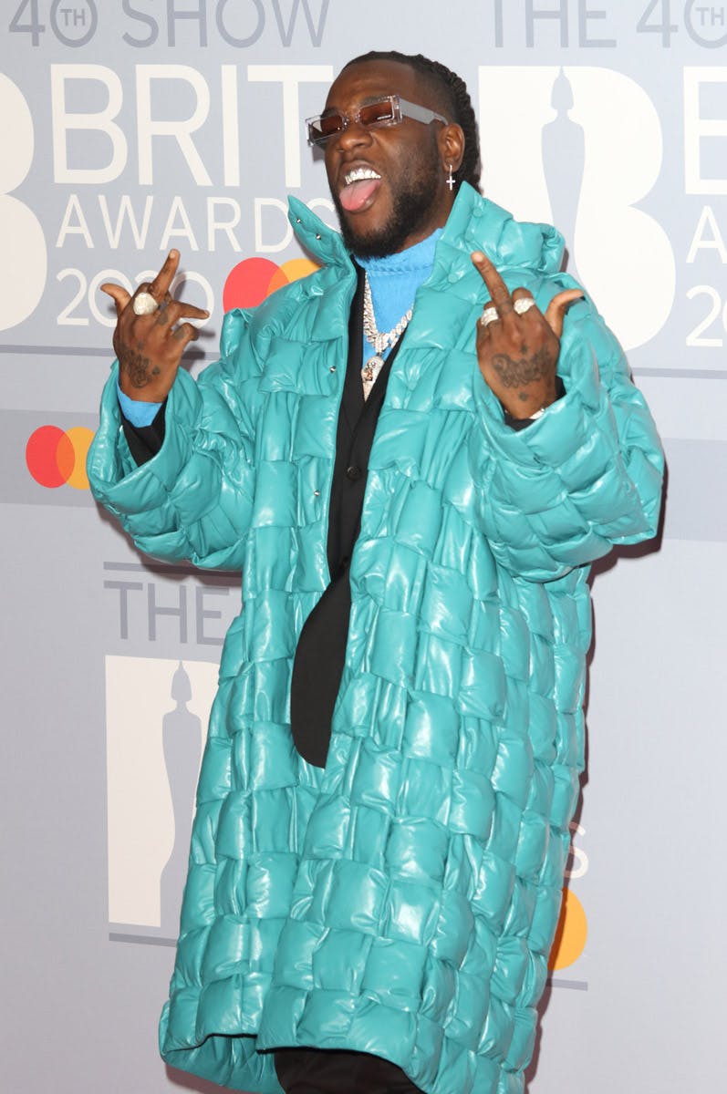 LONDON, UNITED KINGDOM - FEBRUARY 18, 2020: Burna Boy attends the 40th Brit Awards Red Carpet arrivals at The O2 Arena in London.- PHOTOGRAPH BY Keith Mayhew / Echoes Wire/ Barcroft Media (Photo credit should read Keith Mayhew / Echoes Wire/Barcroft Media via Getty Images)