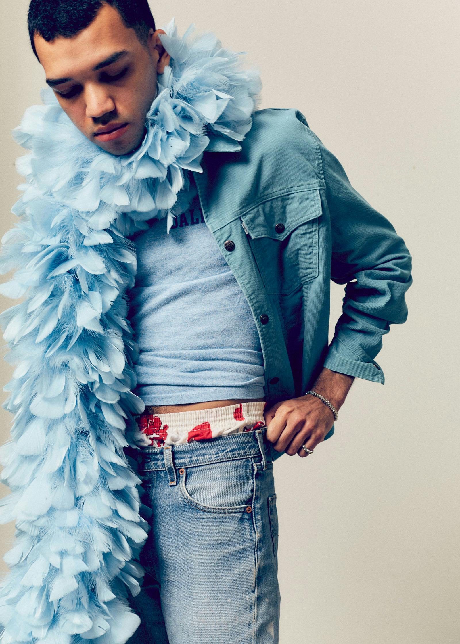 Top, boxers, and scarf PALACE COSTUME Jacket and jeans LEVI’S Bracelet and ring CARTIER