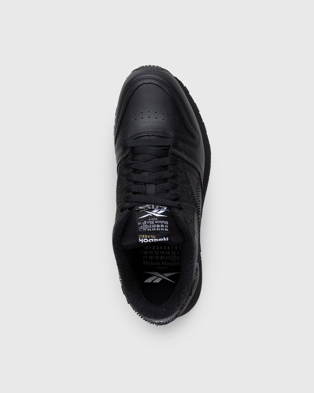 All black reebok shoes store