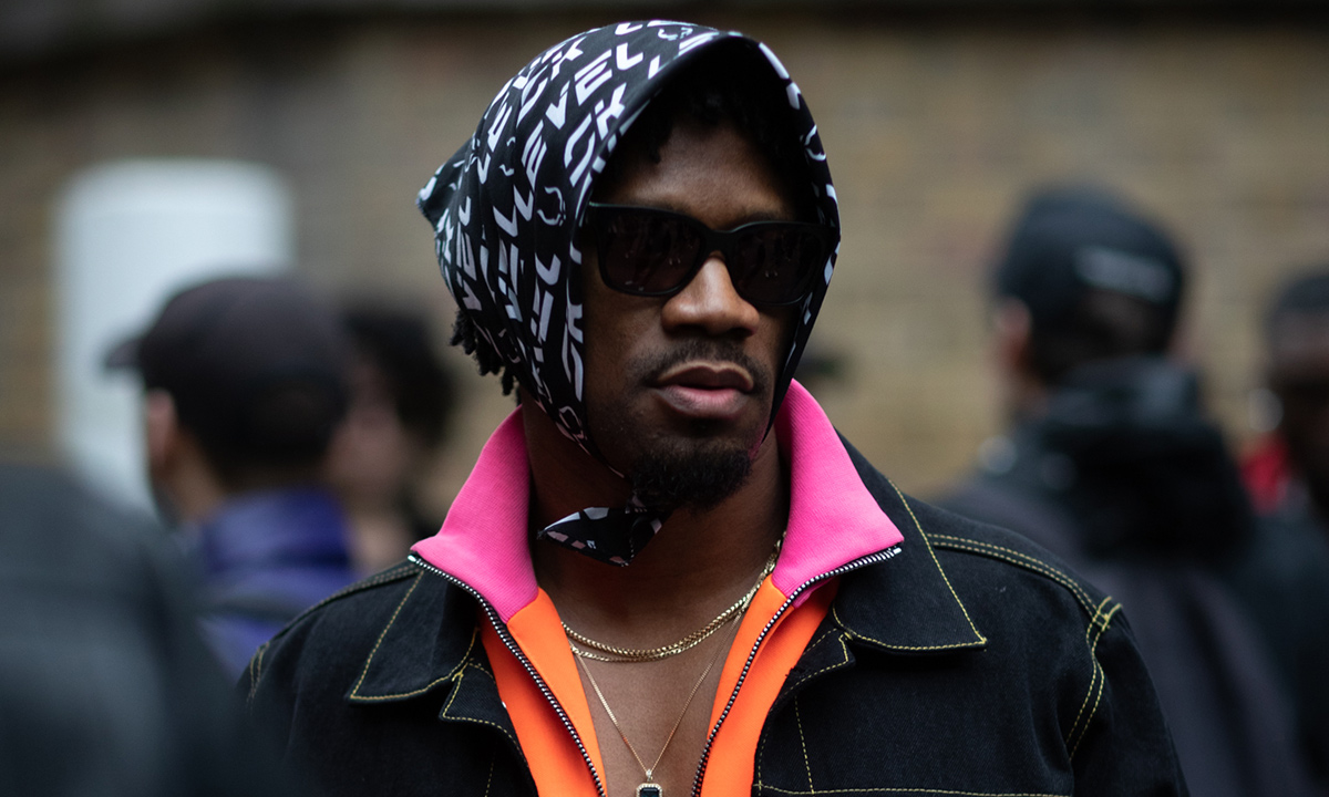 Man Wearing Sunglasses and Head Scarf