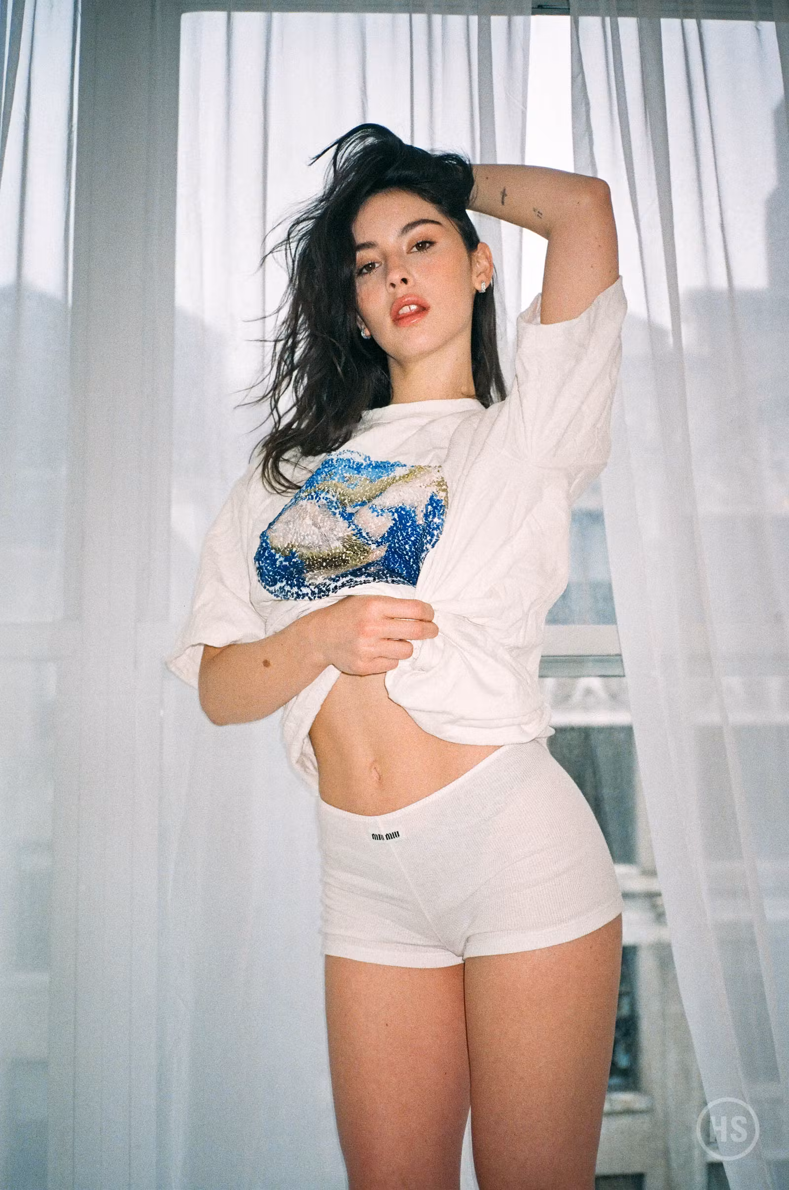 Top JW ANDERSON Briefs MIU MIU Earrings PANDORA Socks STYLIST’S OWN