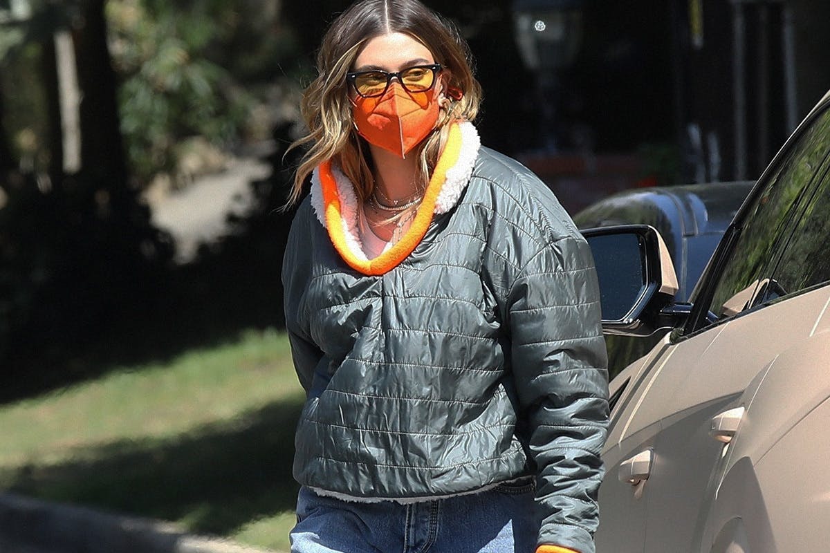 hailey bieber in face mask and sunglasses