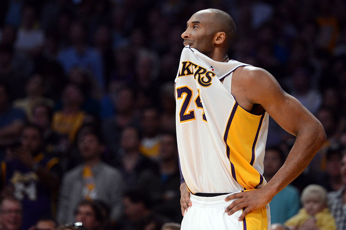 Kobe Bryant watches Lakers game wearing #24 jersey